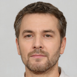 Neutral white adult male with short  brown hair and brown eyes