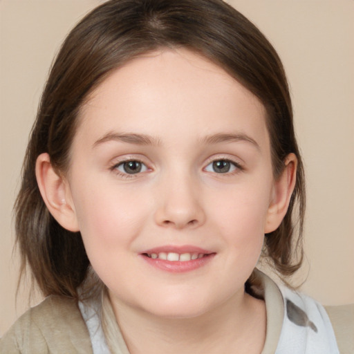 Joyful white child female with medium  brown hair and brown eyes