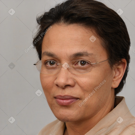 Joyful white adult female with short  brown hair and brown eyes