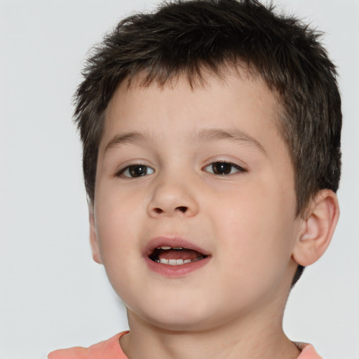 Joyful white child male with short  brown hair and brown eyes