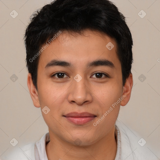 Joyful asian young-adult male with short  brown hair and brown eyes