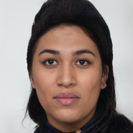 Neutral latino young-adult female with long  black hair and brown eyes