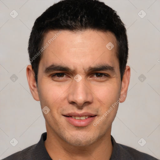 Joyful white young-adult male with short  black hair and brown eyes