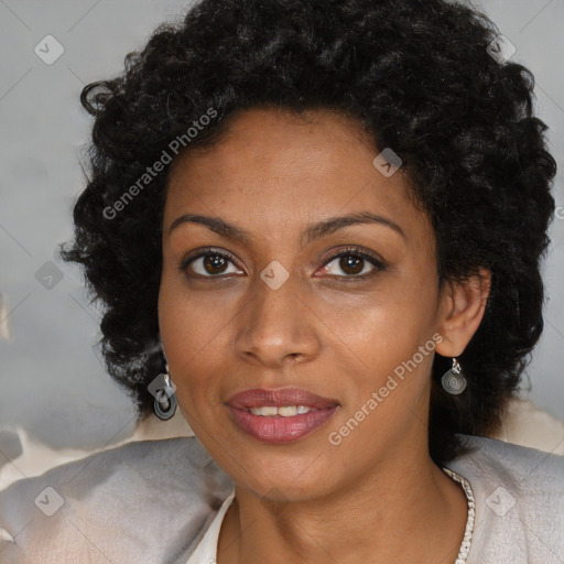 Joyful black young-adult female with long  brown hair and brown eyes