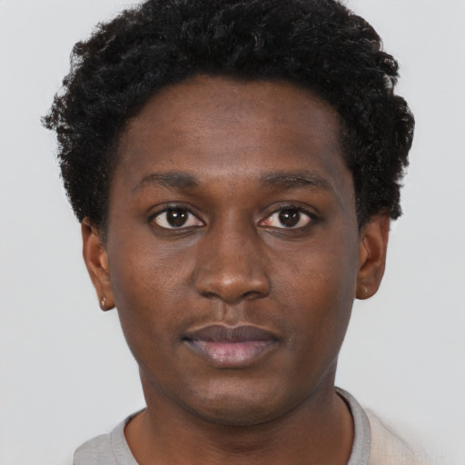 Neutral black young-adult male with short  brown hair and brown eyes