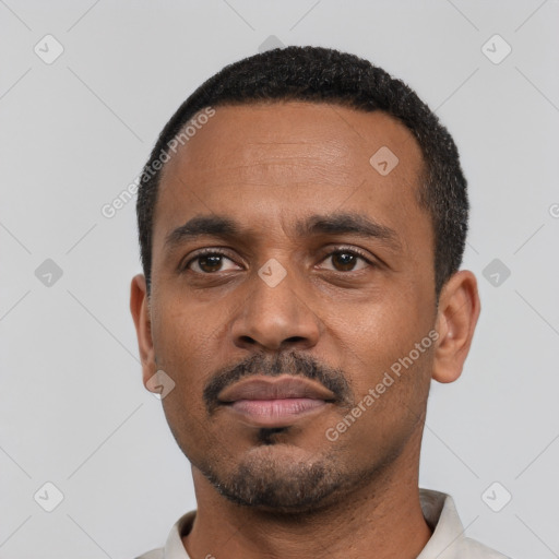 Neutral black young-adult male with short  black hair and brown eyes