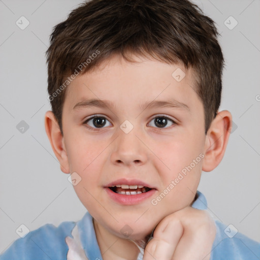 Joyful white child male with short  brown hair and brown eyes