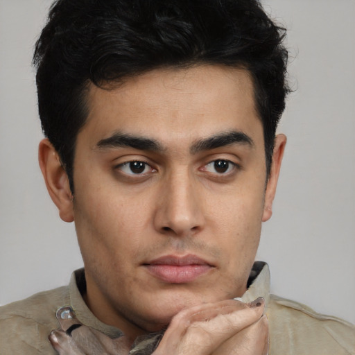 Neutral latino young-adult male with short  black hair and brown eyes
