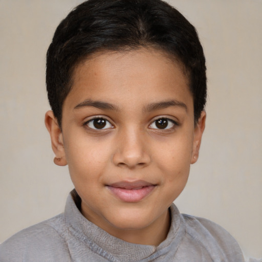 Joyful latino child female with short  brown hair and brown eyes