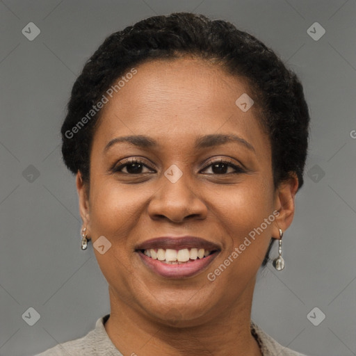 Joyful latino adult female with short  brown hair and brown eyes