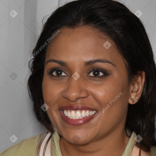 Joyful black young-adult female with medium  brown hair and brown eyes