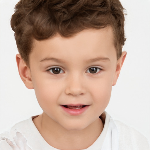 Joyful white child male with short  brown hair and brown eyes