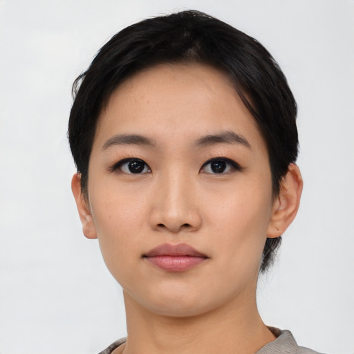 Neutral asian young-adult female with short  black hair and brown eyes