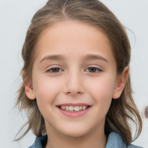 Joyful white child female with medium  brown hair and brown eyes