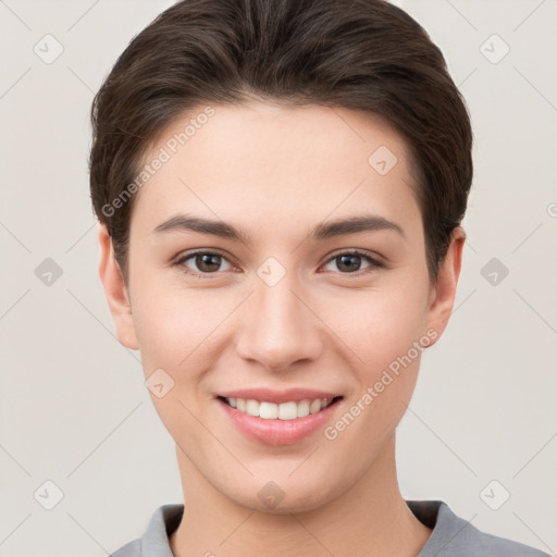 Joyful white young-adult female with short  brown hair and brown eyes