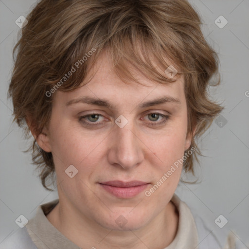 Joyful white adult female with medium  brown hair and blue eyes