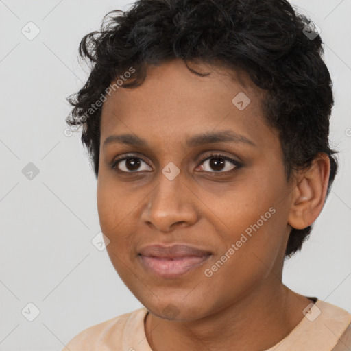 Joyful black young-adult female with short  brown hair and brown eyes