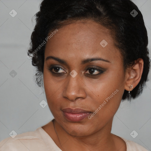 Neutral black young-adult female with medium  brown hair and brown eyes