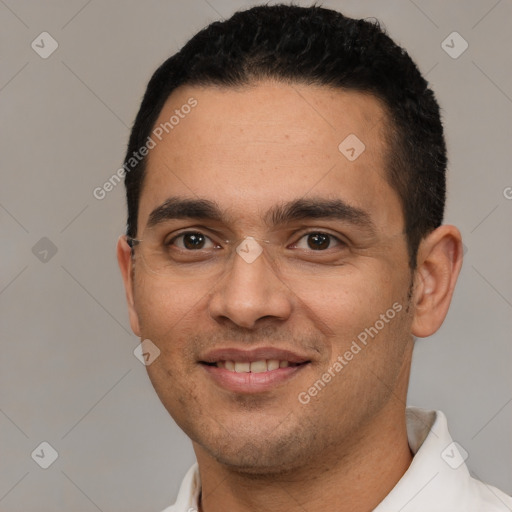 Joyful white young-adult male with short  black hair and brown eyes