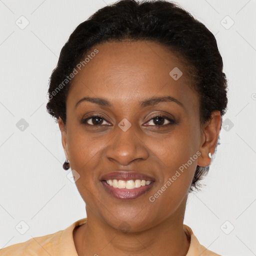 Joyful latino young-adult female with short  brown hair and brown eyes