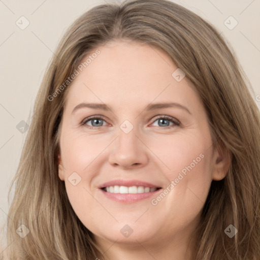 Joyful white young-adult female with long  brown hair and grey eyes