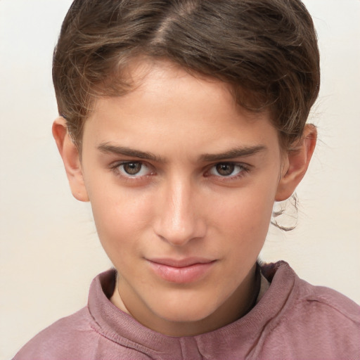 Joyful white child male with short  brown hair and brown eyes