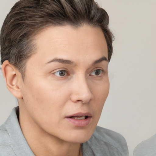 Neutral white young-adult female with short  brown hair and brown eyes