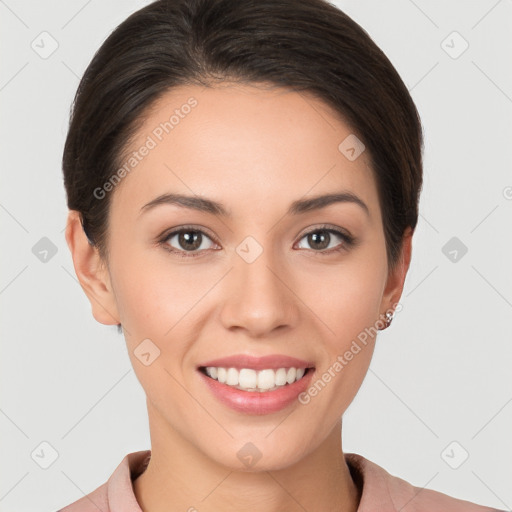 Joyful white young-adult female with short  brown hair and brown eyes