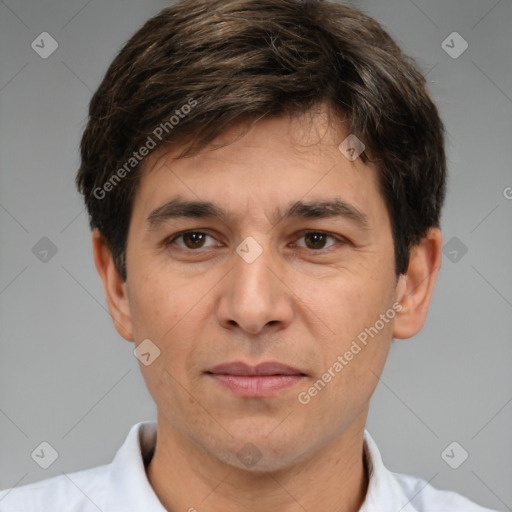 Joyful white adult male with short  brown hair and brown eyes