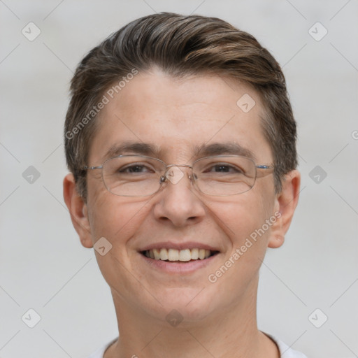 Joyful white adult male with short  brown hair and brown eyes