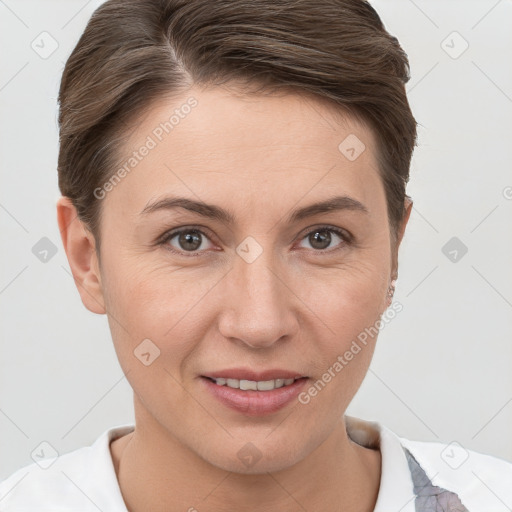 Joyful white young-adult female with short  brown hair and brown eyes