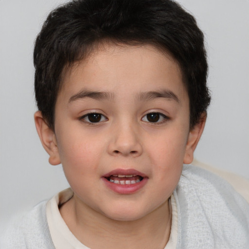 Joyful white child female with short  brown hair and brown eyes