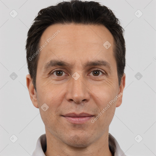 Joyful white adult male with short  brown hair and brown eyes