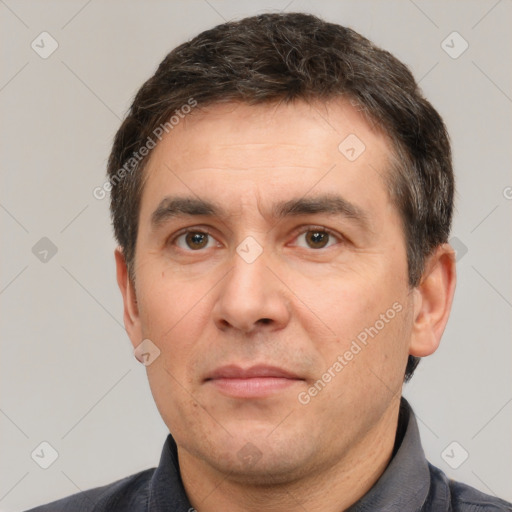 Neutral white adult male with short  brown hair and brown eyes