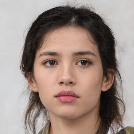 Neutral white young-adult female with medium  brown hair and brown eyes