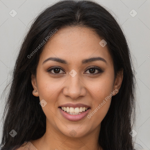 Joyful latino young-adult female with long  brown hair and brown eyes