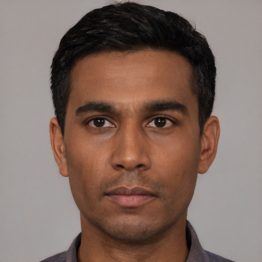 Neutral latino young-adult male with short  black hair and brown eyes