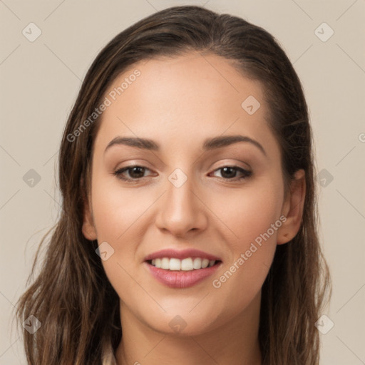 Joyful white young-adult female with long  brown hair and brown eyes