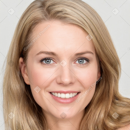 Joyful white young-adult female with long  brown hair and blue eyes