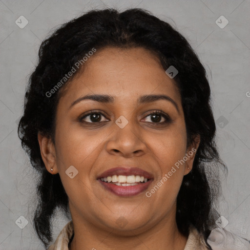 Joyful black adult female with medium  brown hair and brown eyes