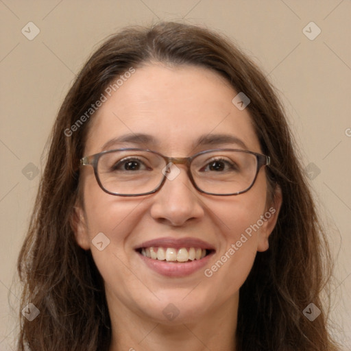 Joyful white adult female with long  brown hair and brown eyes