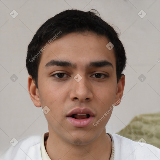 Neutral white young-adult male with short  black hair and brown eyes
