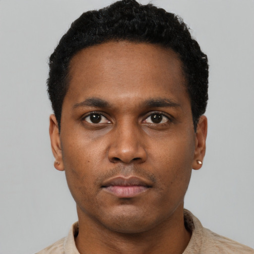 Neutral black young-adult male with short  black hair and brown eyes