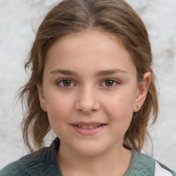 Joyful white child female with medium  brown hair and grey eyes