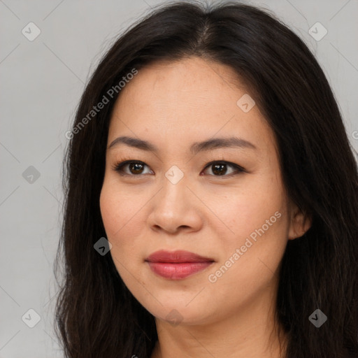 Joyful asian young-adult female with long  brown hair and brown eyes