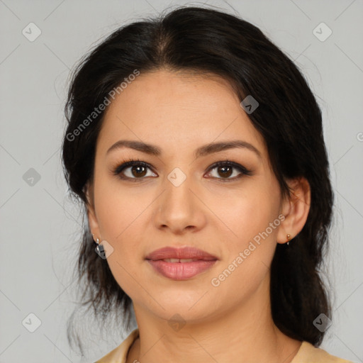 Joyful latino young-adult female with medium  brown hair and brown eyes