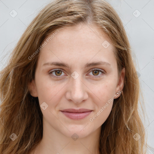 Joyful white young-adult female with long  brown hair and green eyes