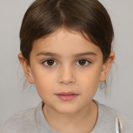 Neutral white child female with medium  brown hair and brown eyes