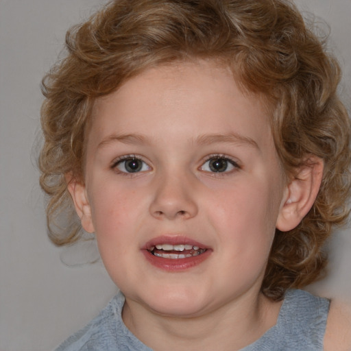 Joyful white child female with medium  brown hair and blue eyes