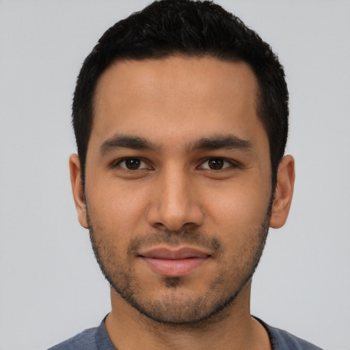 Neutral latino young-adult male with short  black hair and brown eyes